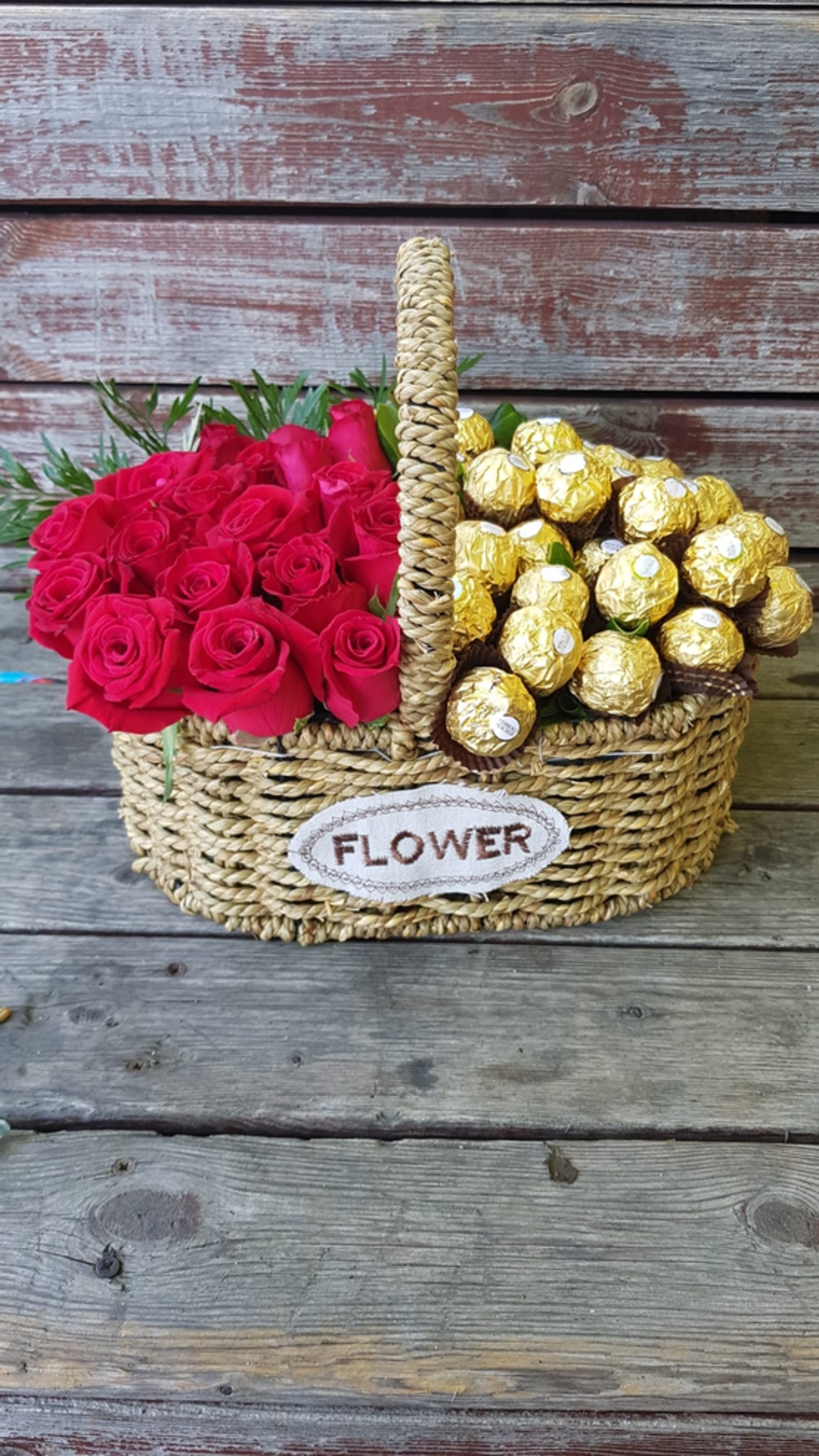 A case of roses and Ferrero Rocher in a basket