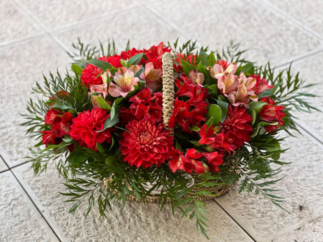 Arrangement of alstroemeria dahlias in a basket